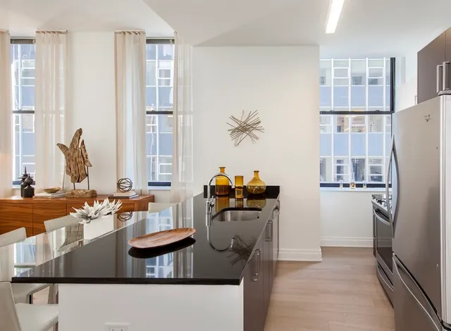 a picture of a wall with a white wall and a refrigerator