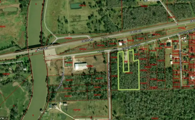 a view of building with yard and staircase