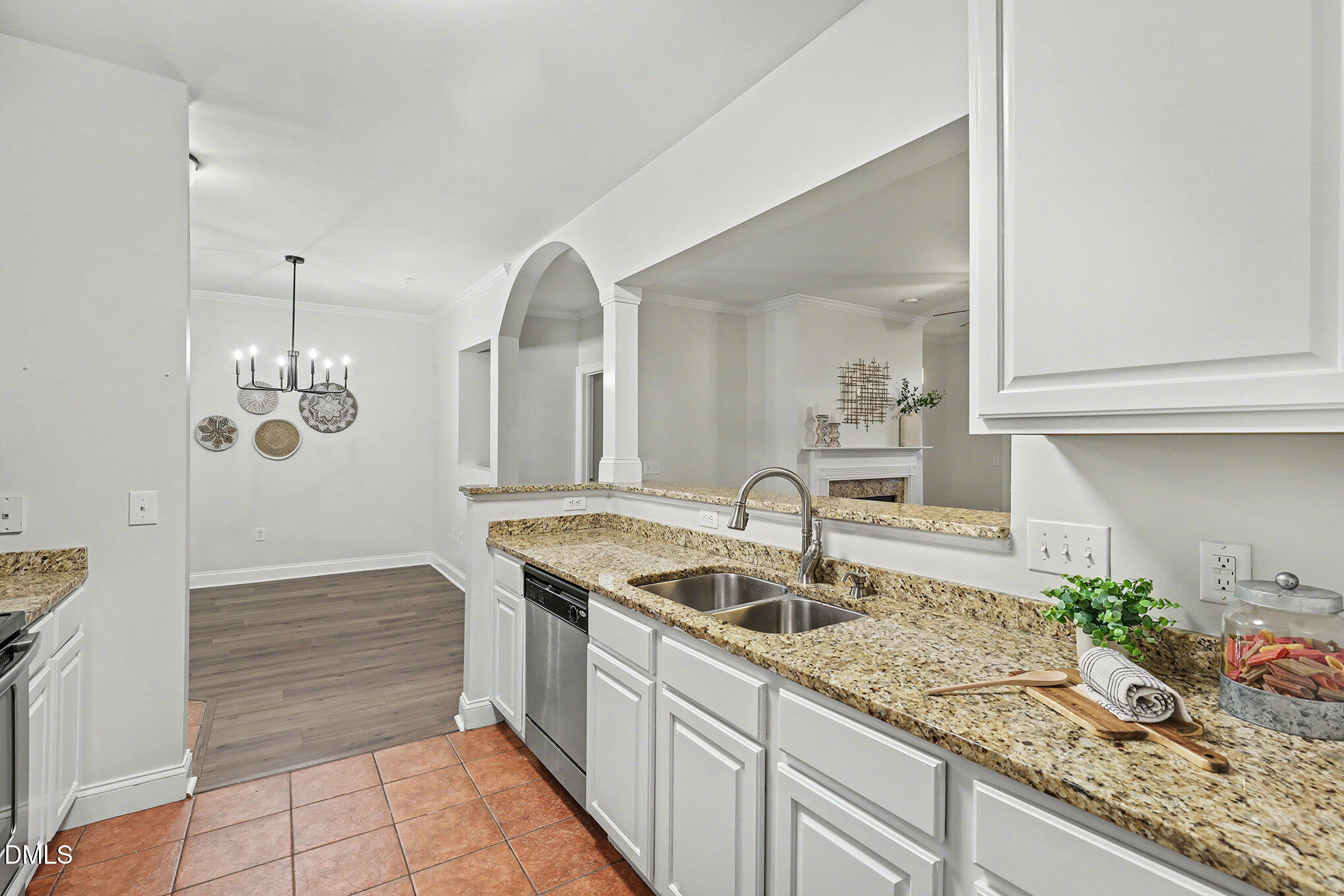 2810 Bedford Green Drive, Unit 207 Raleigh, NC 27604 - Photo 10 of 20 a kitchen with a sink and cabinets