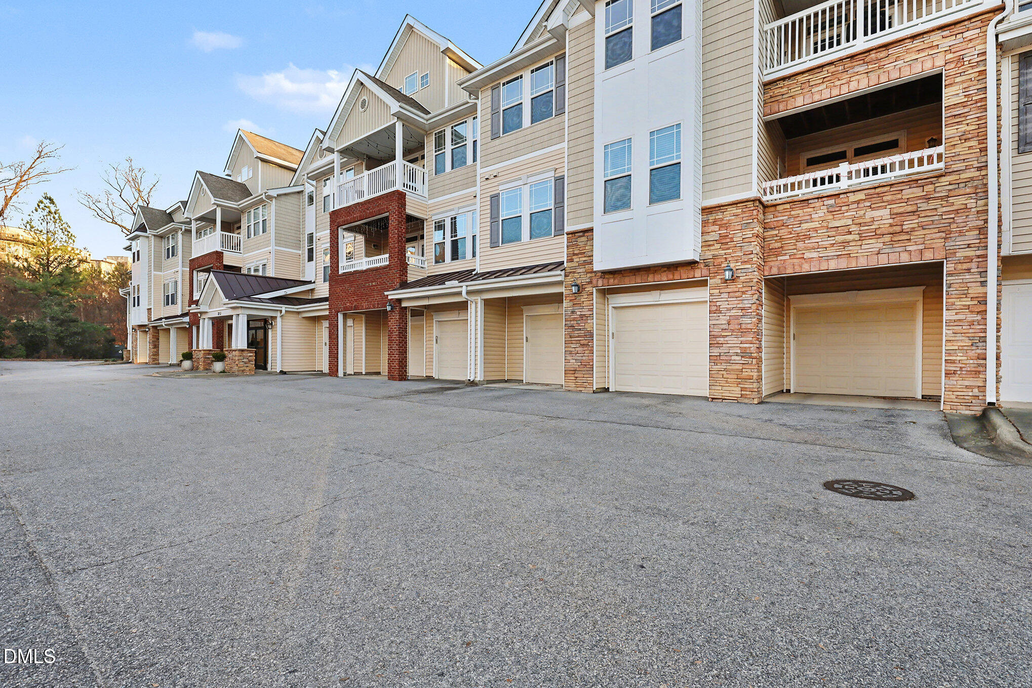 2810 Bedford Green Drive, Unit 207 Raleigh, NC 27604 - Photo 19 of 20 a view of building with a street