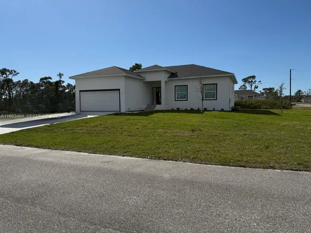 a house view with a garden space