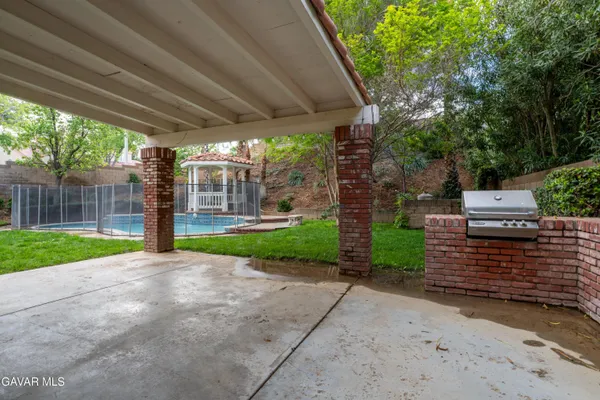 a view of backyard with green space