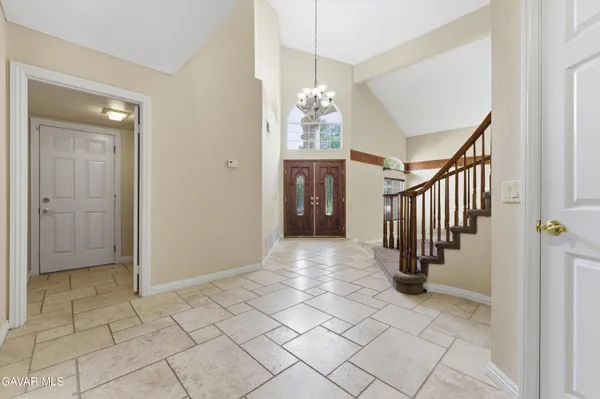 a view of entryway with stairs