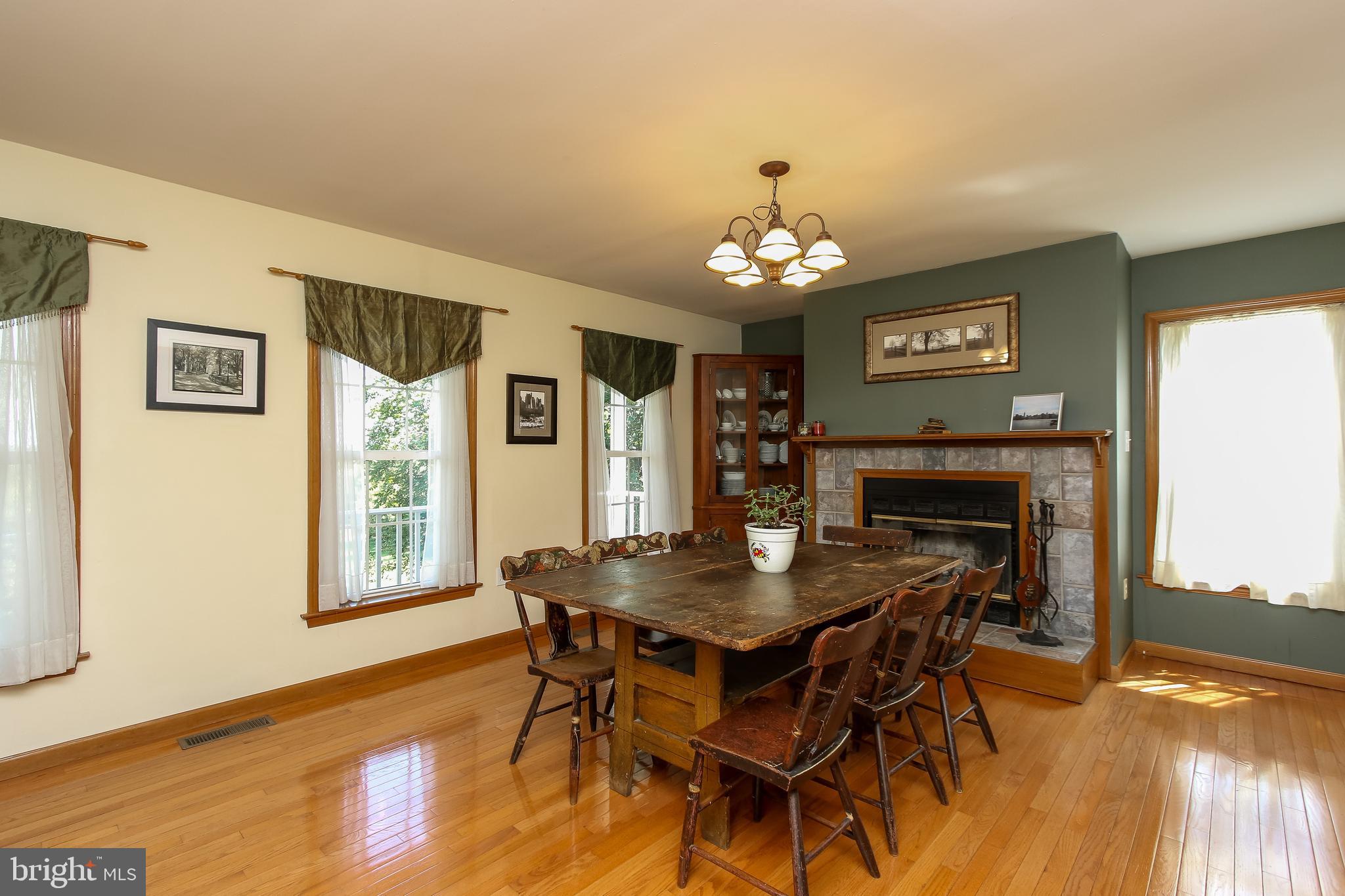 711 North Gorsuch Road Westminster, MD 21157 - Photo 19 of 55 Formal Dining Room with wood-burning fireplace.