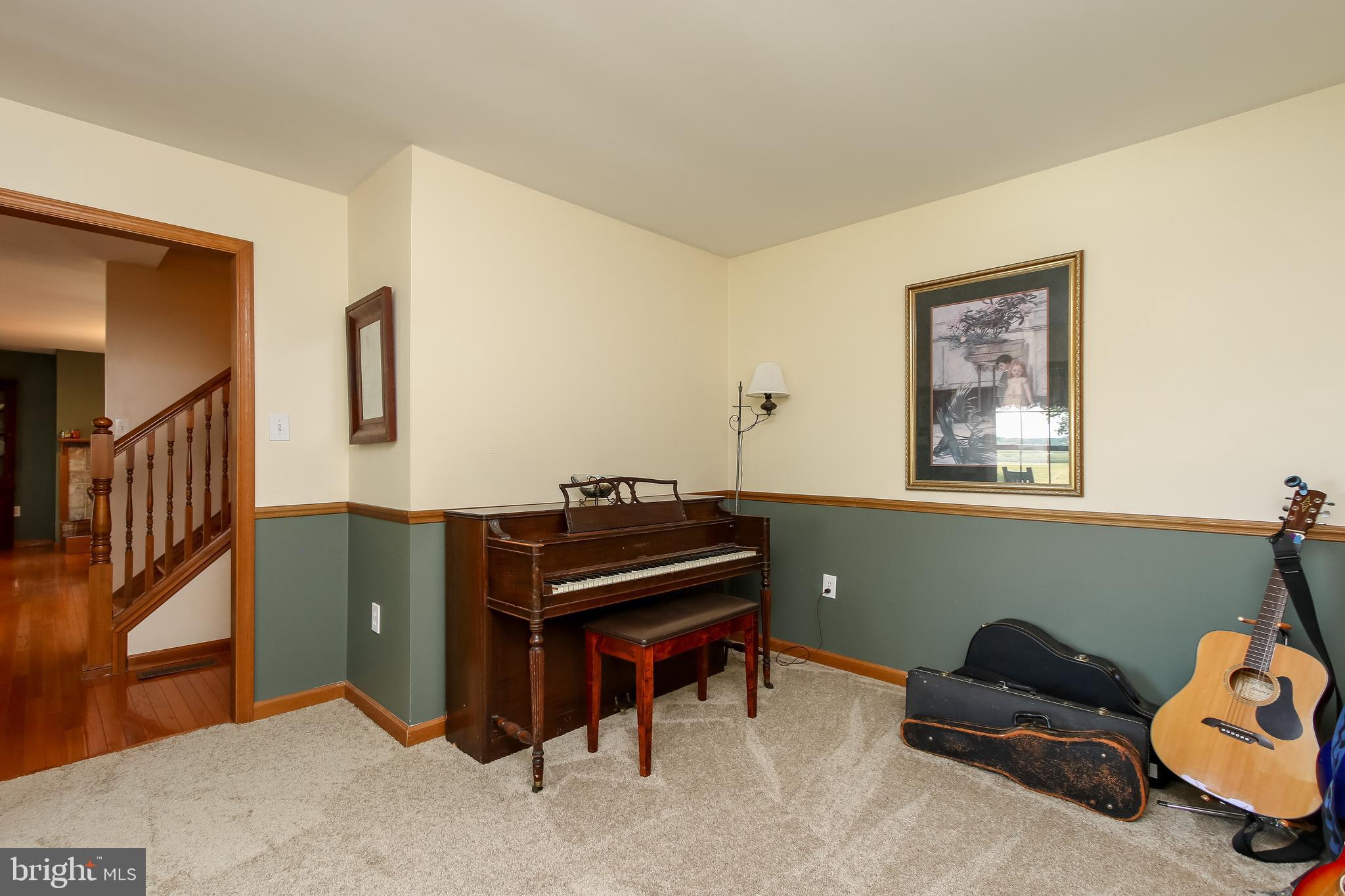 711 North Gorsuch Road Westminster, MD 21157 - Photo 24 of 55 The Living Room has chair railing.