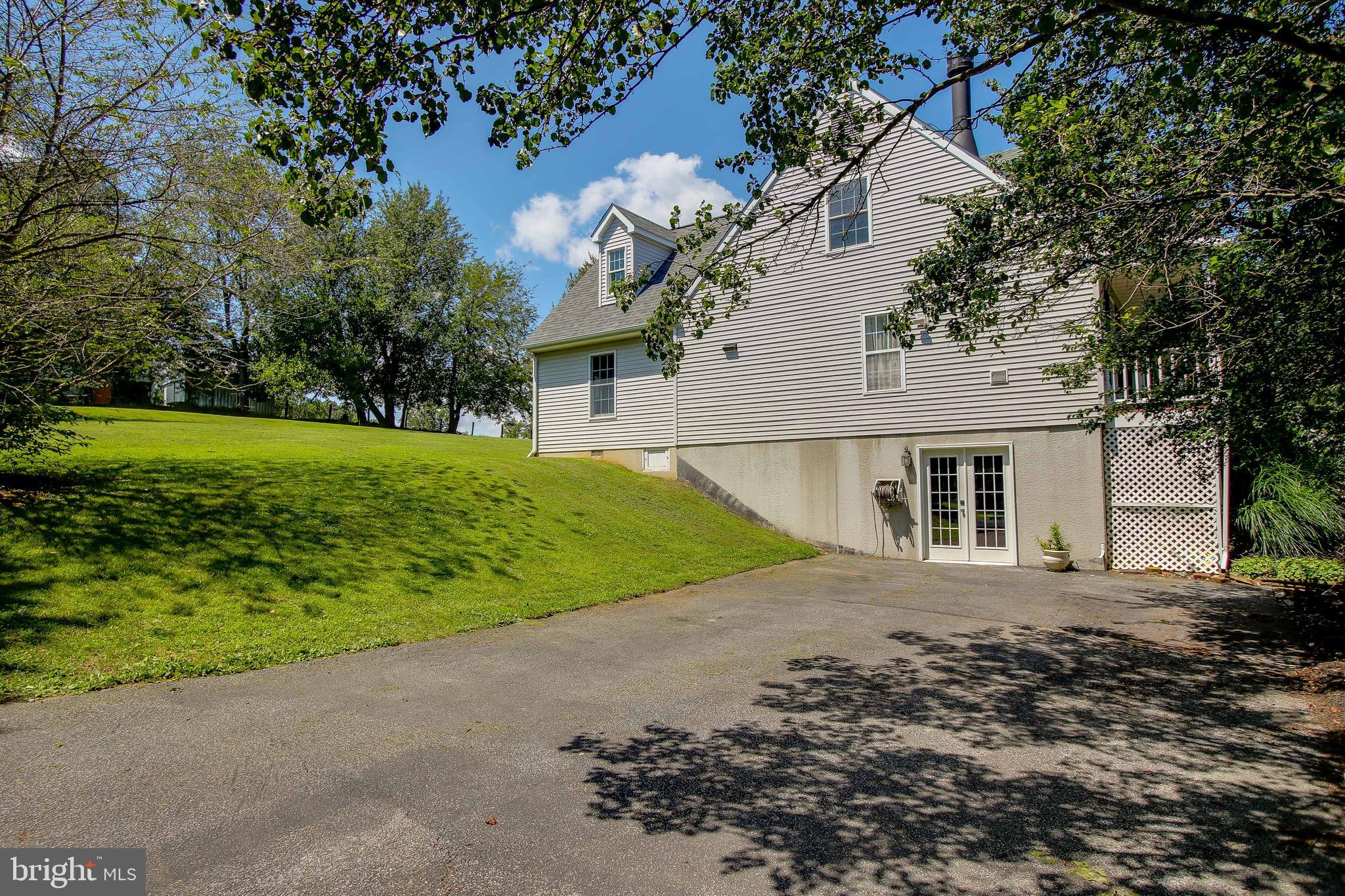 711 North Gorsuch Road Westminster, MD 21157 - Photo 46 of 55 Side View showing driveway.