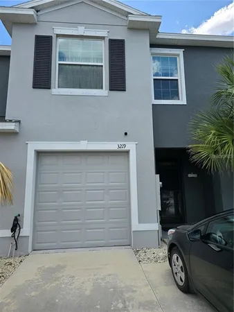 a car parked in front of a house