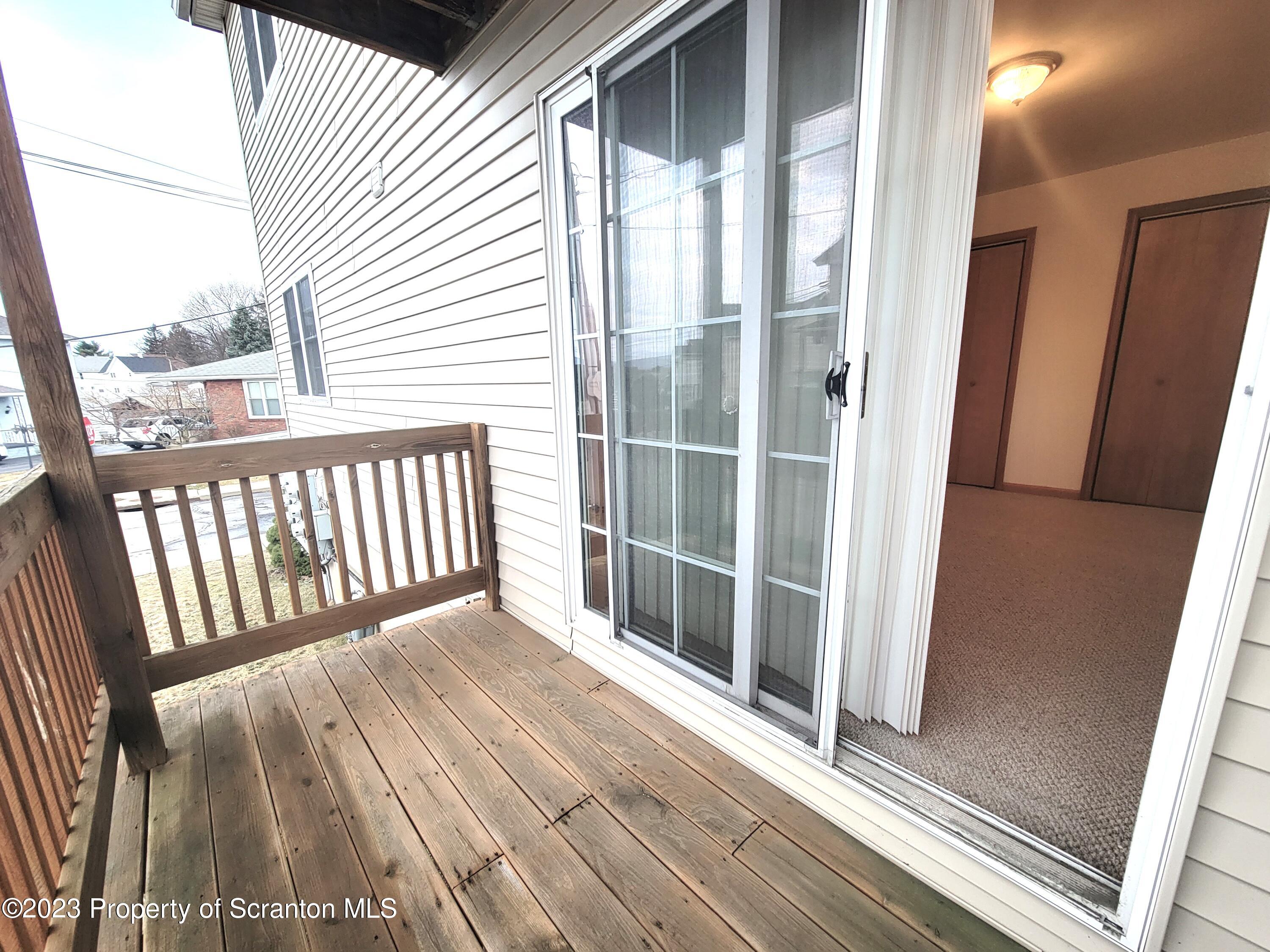 128 Mortimer Street, Unit 2R Dunmore, PA 18512 - Photo 2 of 7 a view of wooden balcony