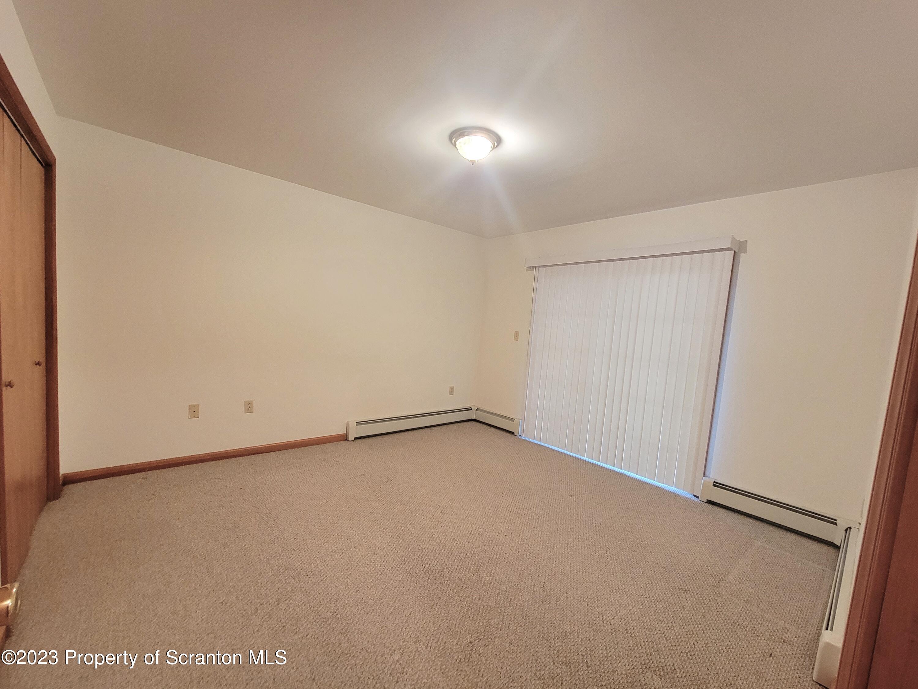 128 Mortimer Street, Unit 2R Dunmore, PA 18512 - Photo 5 of 7 a view of an empty room