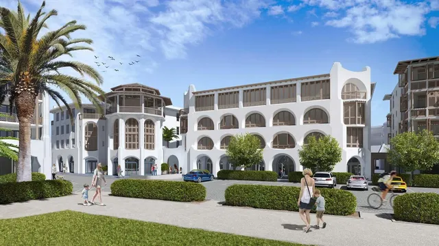 front view of a building with a garden