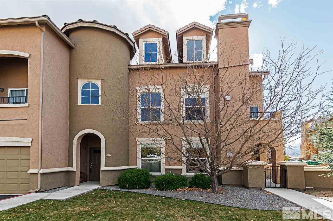 9050 Double R, Unit 325 Reno, NV 89521 - Photo 1 of 1 a front view of a house with garden