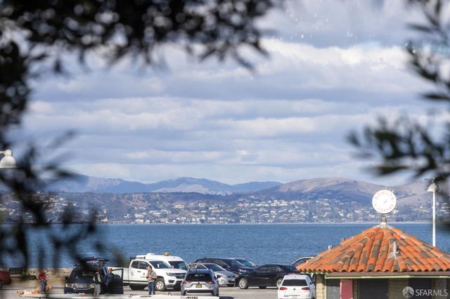 a view of a balcony with city view