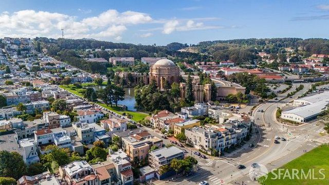 a view of entryway with wooden stairs