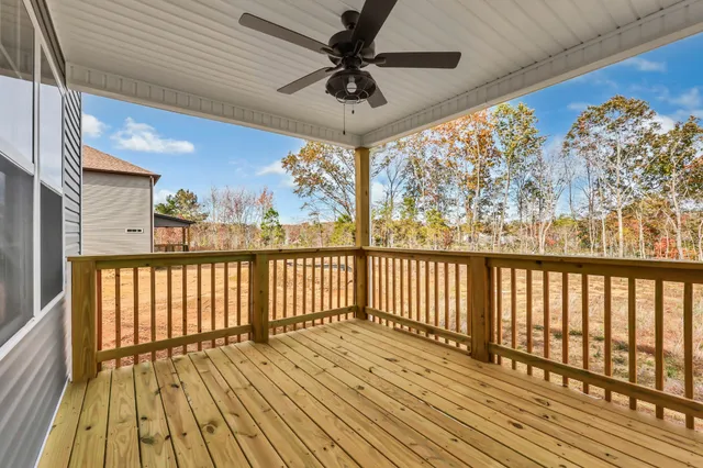 a view of a balcony with wooden floor