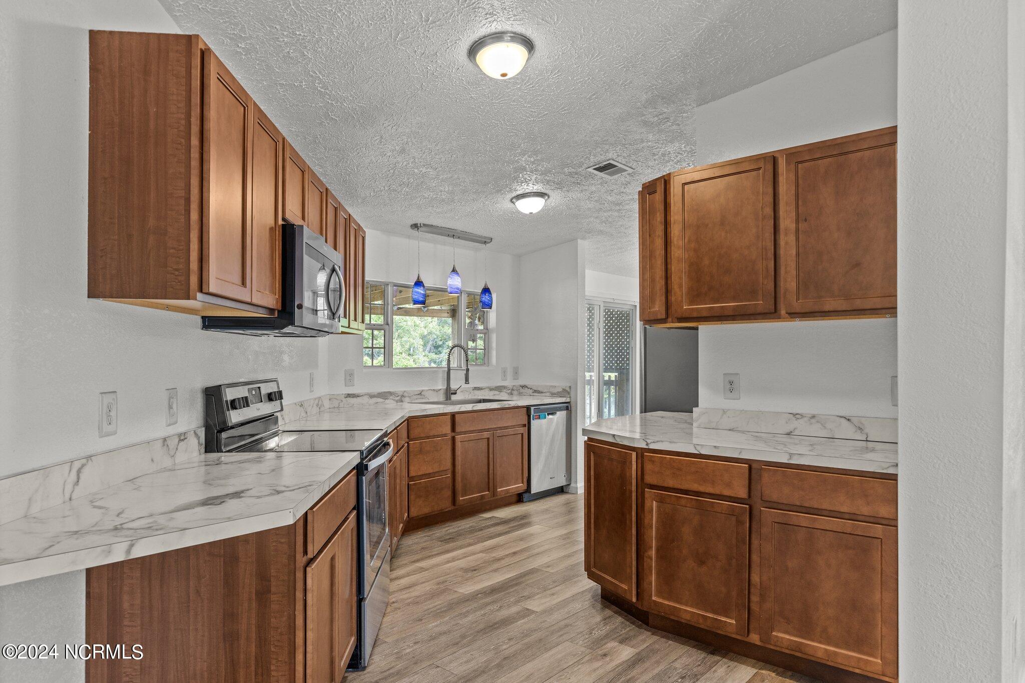 View from Den to Kitchen