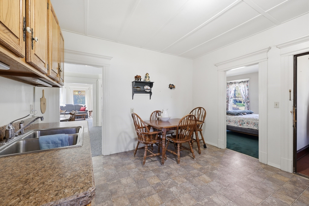 367 Broadway Street, Unit 1 Chicopee, MA 01020 - Photo 14 of 18 a view of a dining room with furniture