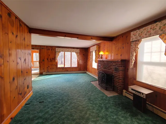 a kitchen with granite countertop stainless steel appliances and wooden cabinets