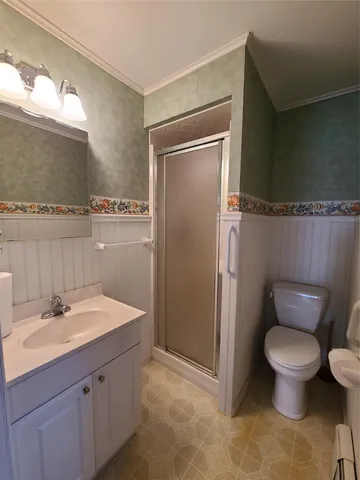 a view of an empty room with windows