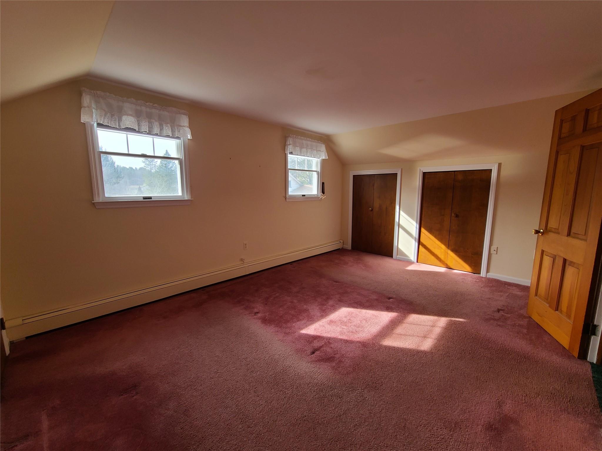 493 Old Taylor Road Jeffersonville, NY 12748 - Photo 21 of 35 a view of an empty room with a window