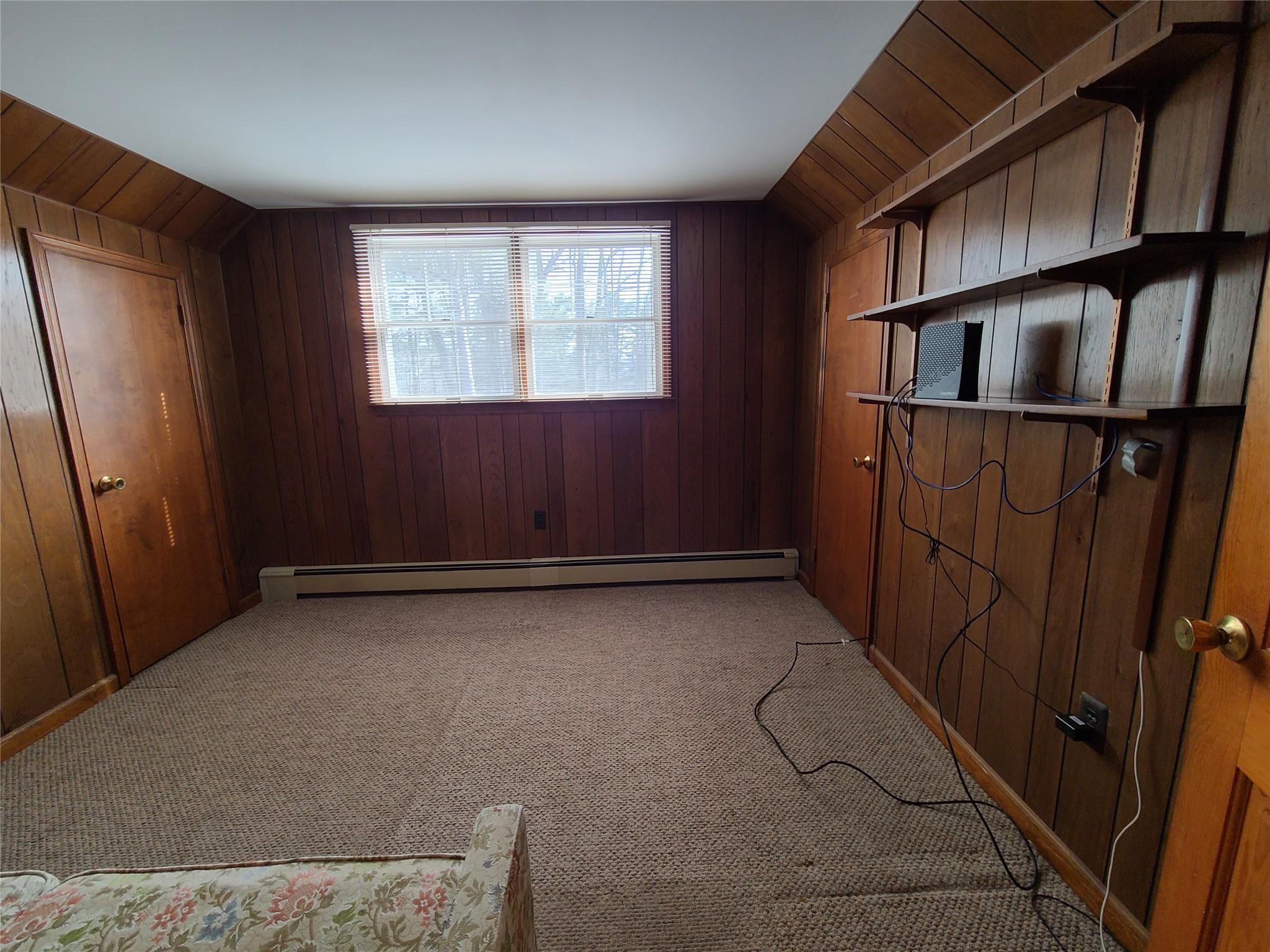 493 Old Taylor Road Jeffersonville, NY 12748 - Photo 22 of 35 an empty room with windows