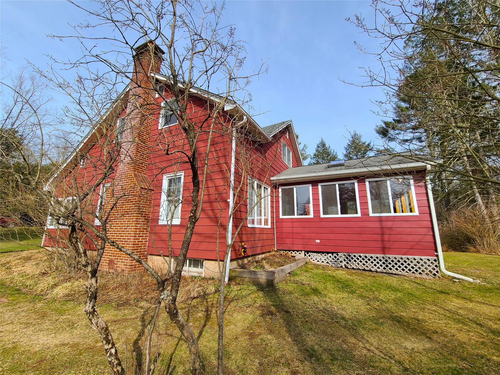 493 Old Taylor Road Jeffersonville, NY 12748 - Photo 32 of 35 a front view of a house with a yard