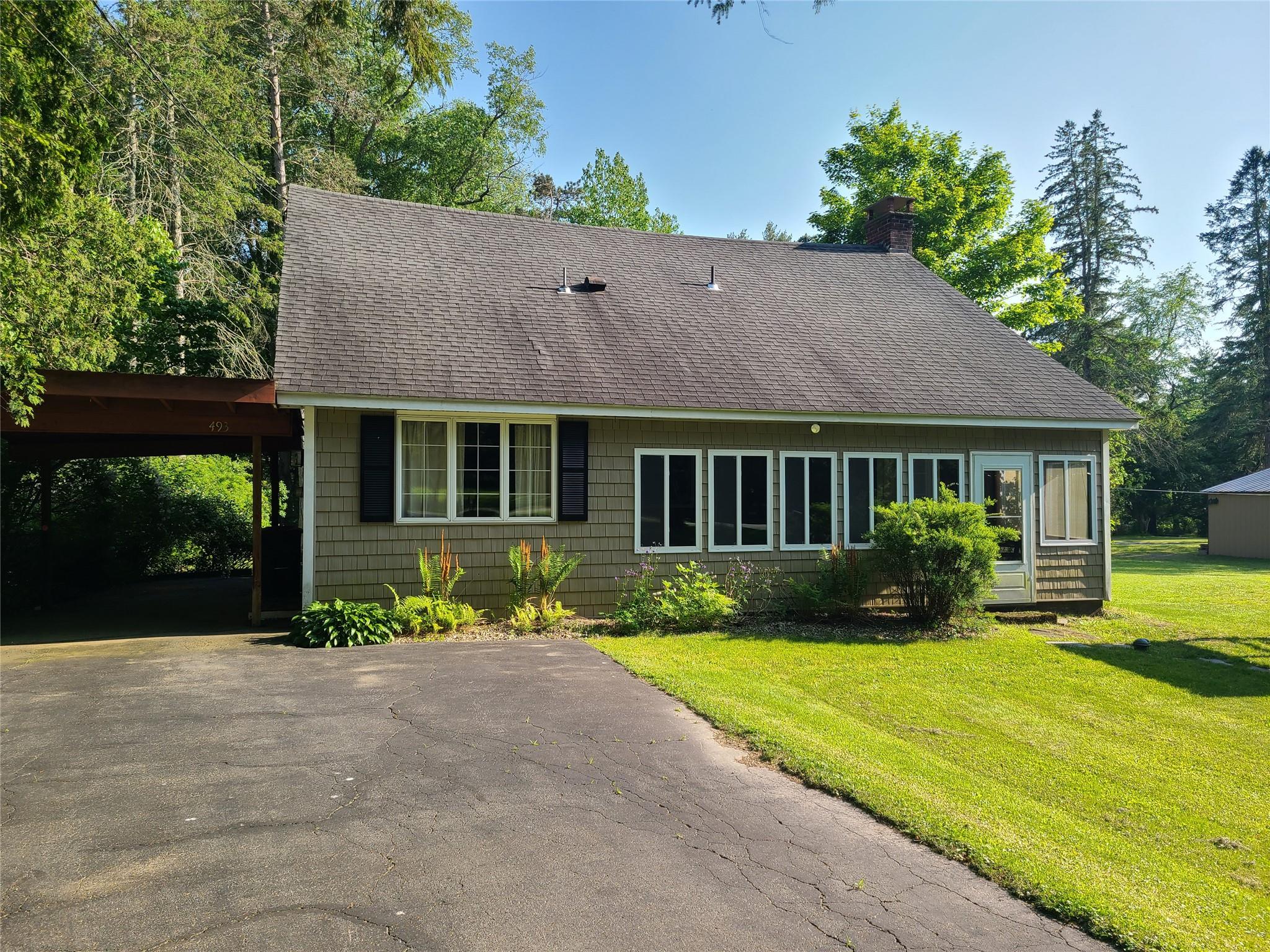 493 Old Taylor Road Jeffersonville, NY 12748 - Photo 5 of 35 a front view of house with yard and green space