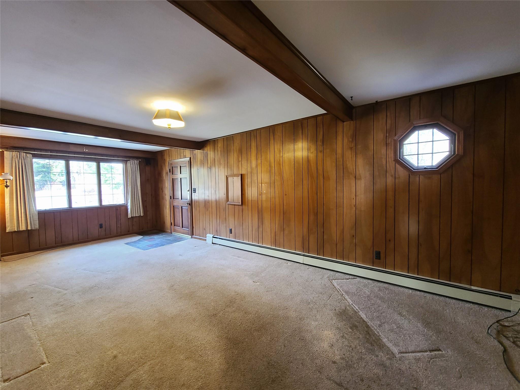 493 Old Taylor Road Jeffersonville, NY 12748 - Photo 8 of 35 an empty room with windows