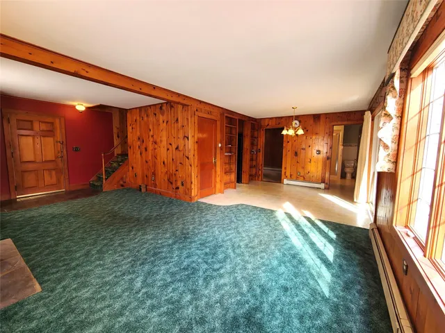 a view of a room window and stairs