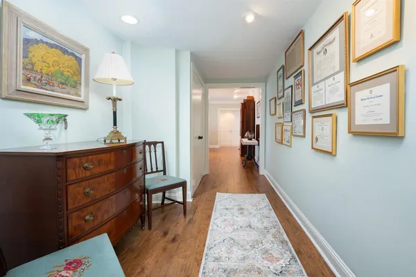 a room with furniture and wooden floor
