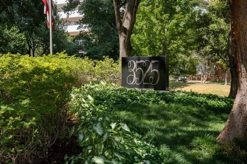 a view of a lake with building in front of it