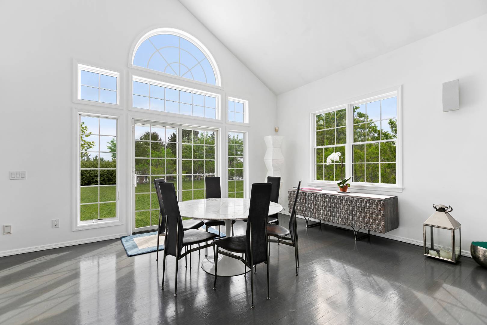 61 Swans Neck Lane Water Mill, NY 11976 - Photo 11 of 33 a view of a dining room with furniture window and wooden floor
