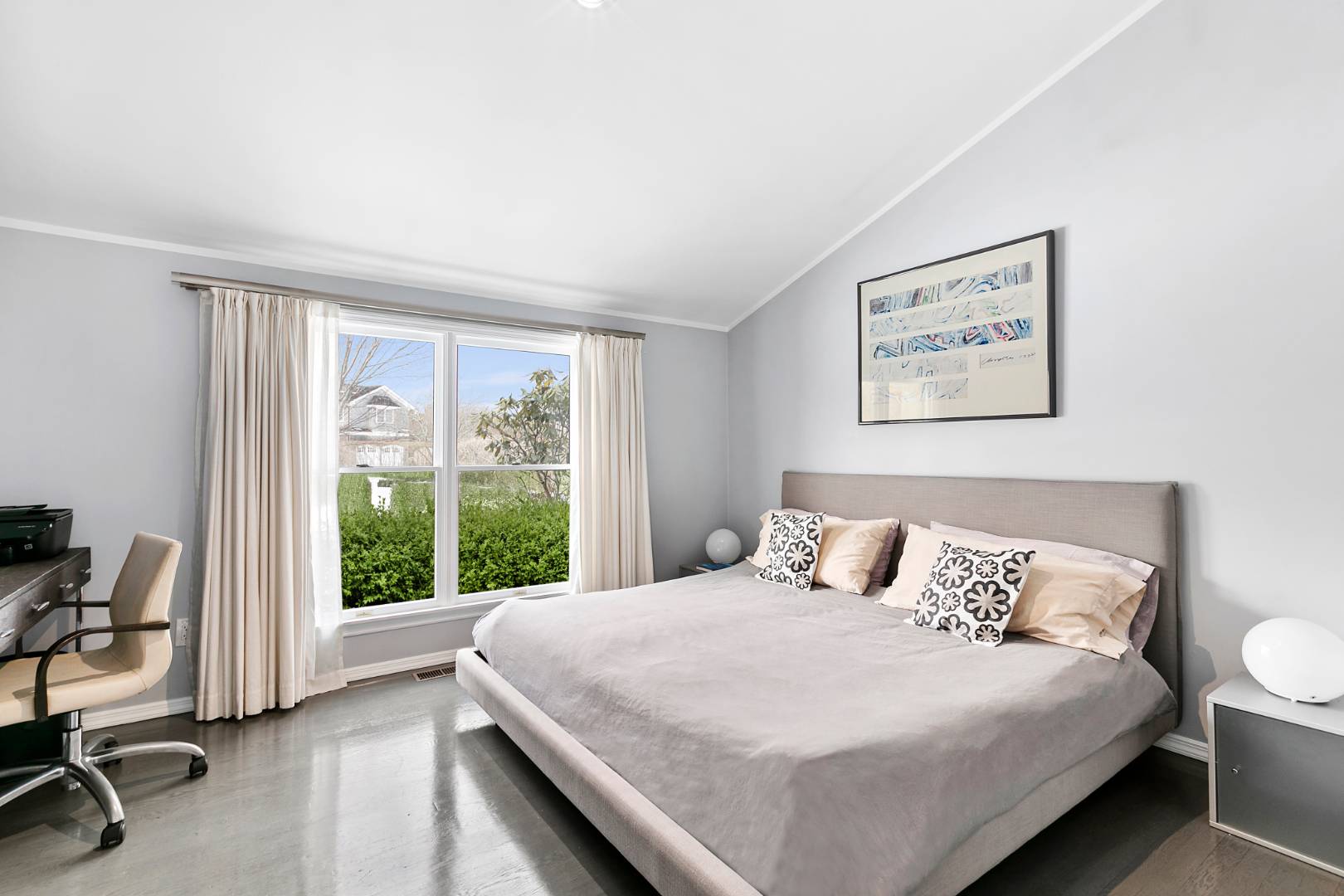 61 Swans Neck Lane Water Mill, NY 11976 - Photo 17 of 33 a bedroom with a large bed and a large window