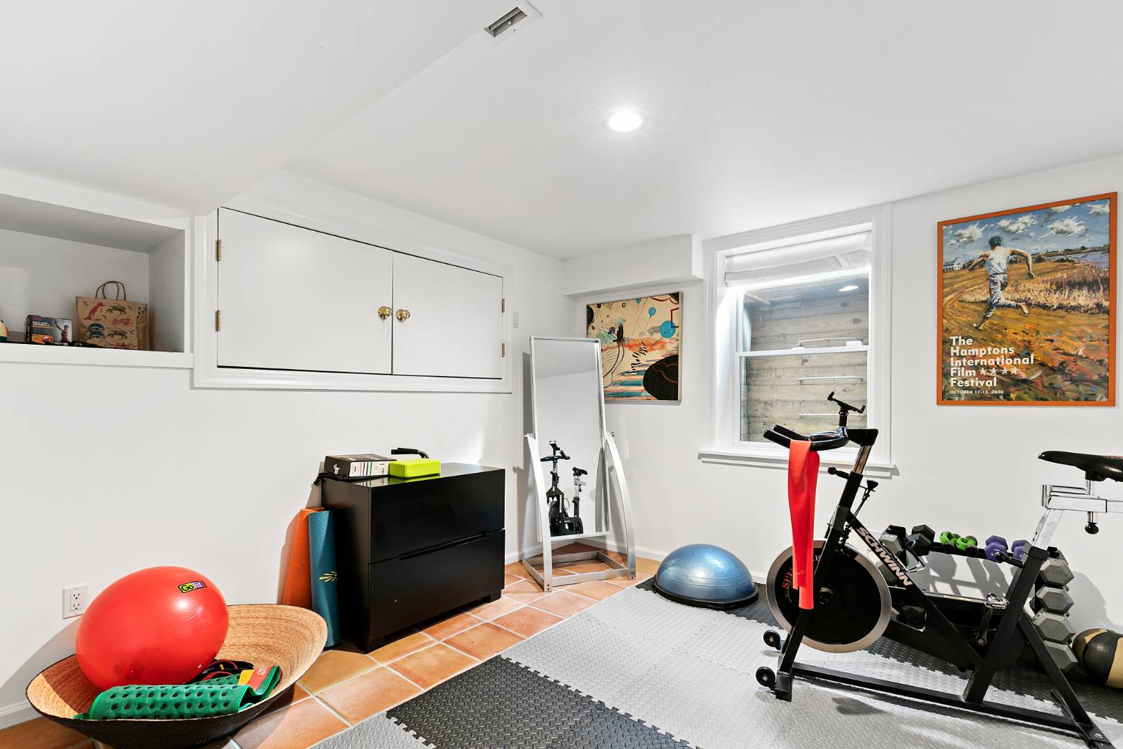 61 Swans Neck Lane Water Mill, NY 11976 - Photo 26 of 33 a view of a room with gym equipment