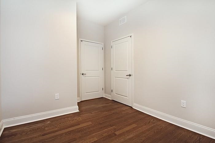 100 Marshall Street, Unit 508 Hoboken, NJ 07030 - Photo 6 of 9 an empty room with wooden floor