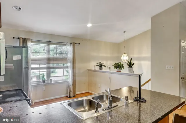 a room with table and chairs