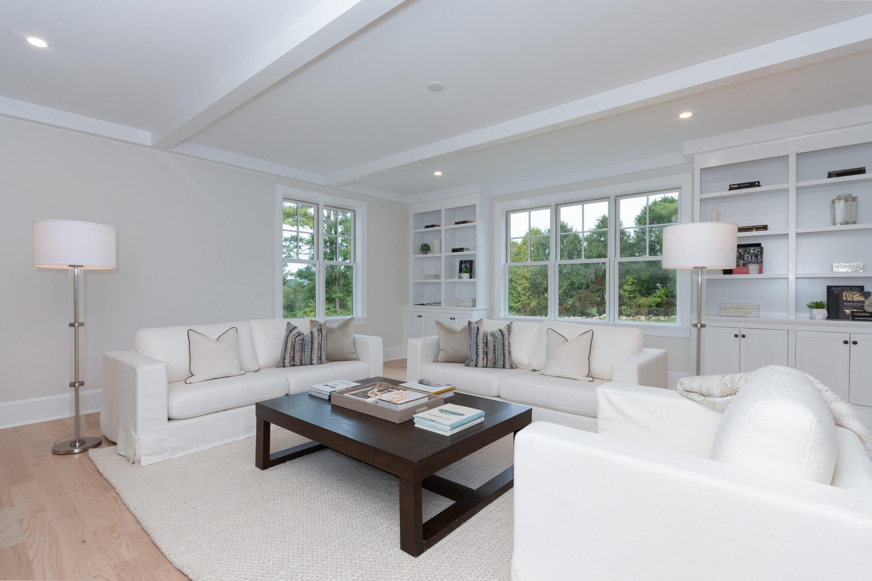 188 Brushy Ridge Road New Canaan, CT 06840 - Photo 12 of 32 a living room with furniture and a large window