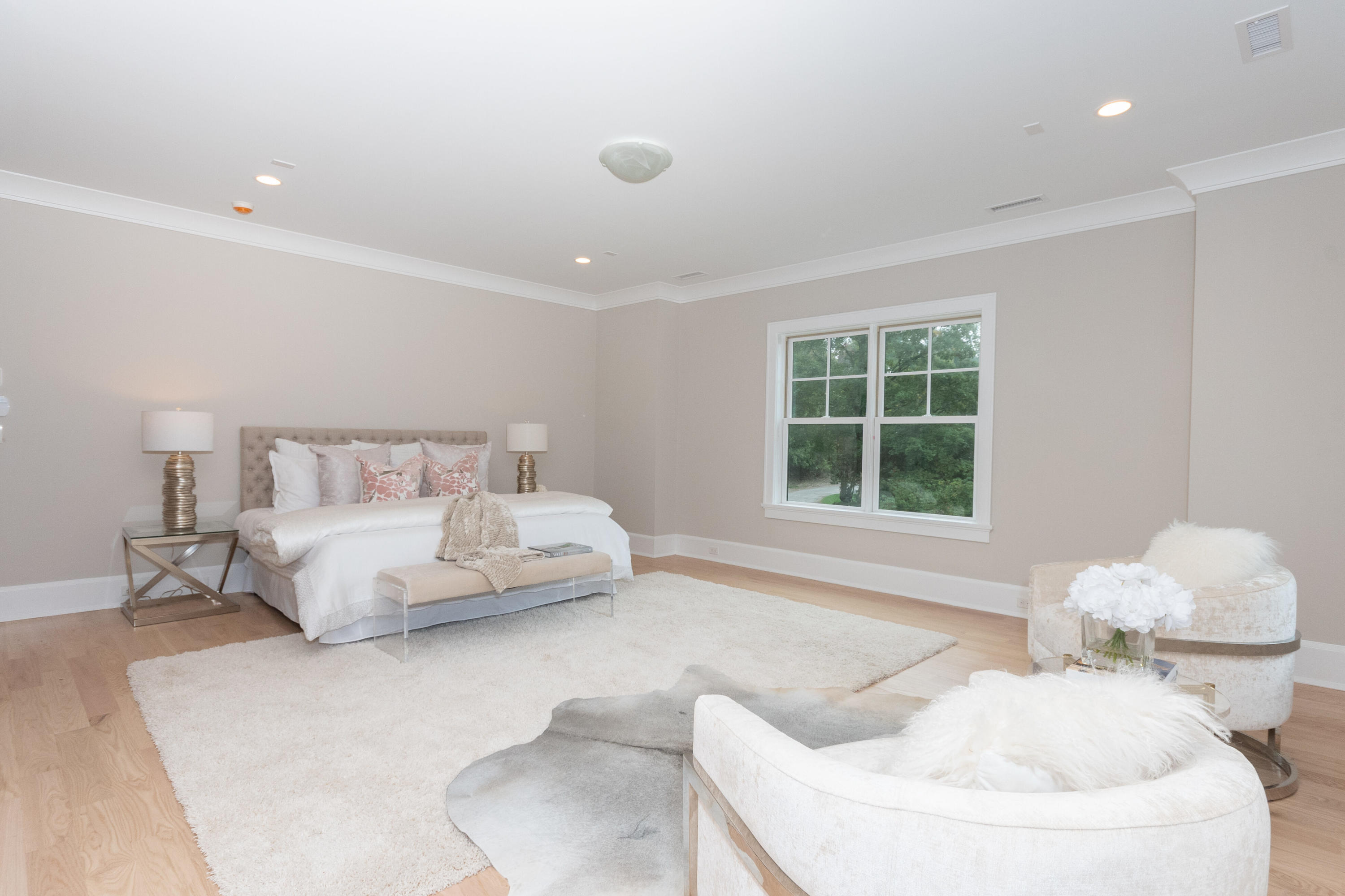 188 Brushy Ridge Road New Canaan, CT 06840 - Photo 22 of 32 a bedroom with a bed and a large window