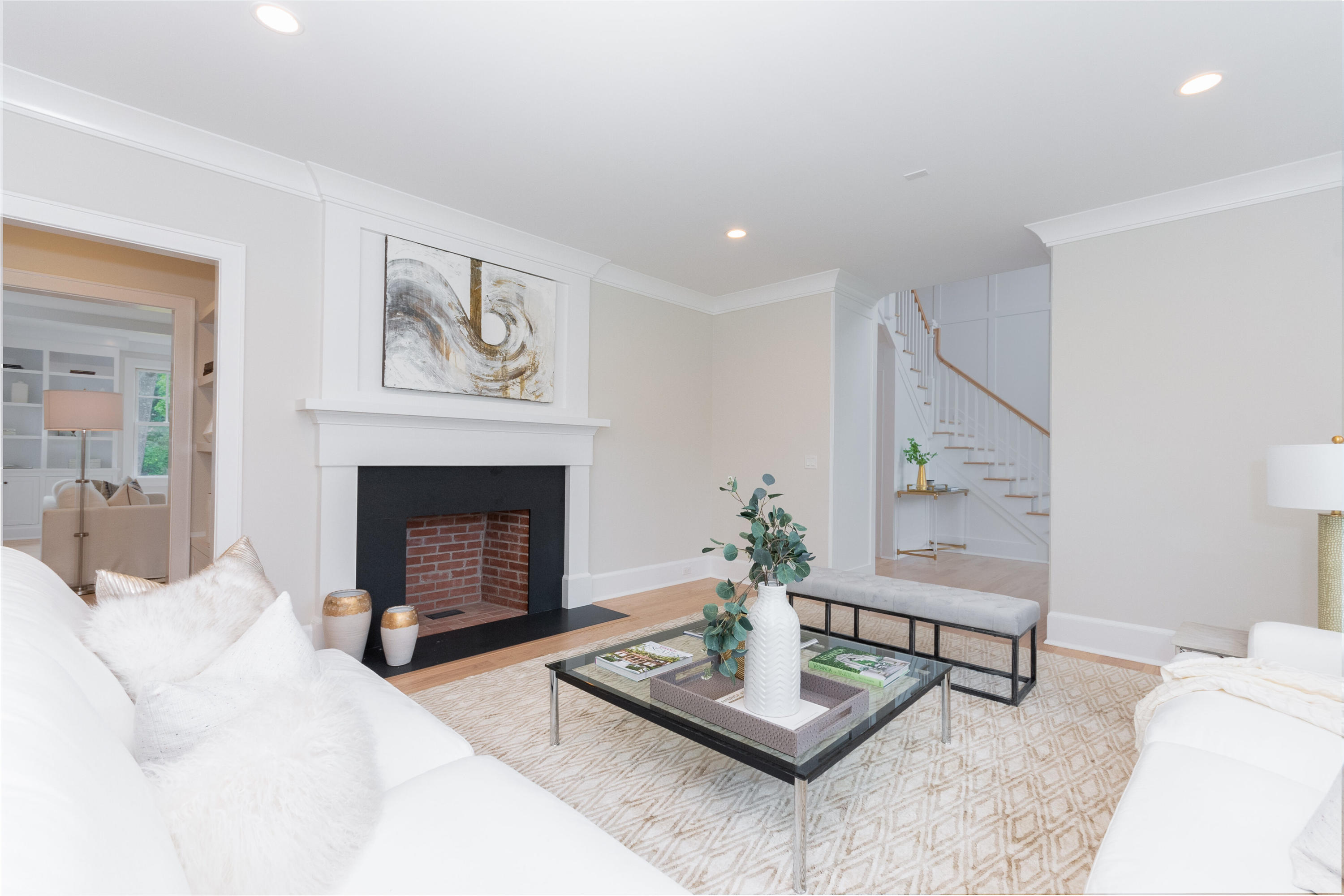 188 Brushy Ridge Road New Canaan, CT 06840 - Photo 8 of 32 a living room with furniture and a fireplace