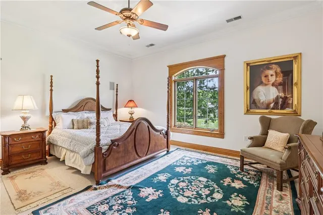 a living room with furniture rug and window
