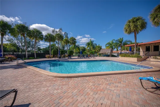a view of outdoor space with swimming pool