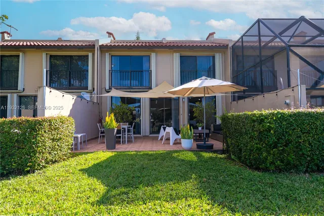 a couple of table and chairs under the deck