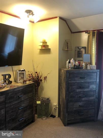 4539 Fernhill Road Philadelphia, PA 19144 - Photo 8 of 10 a living room with furniture and a flat screen tv