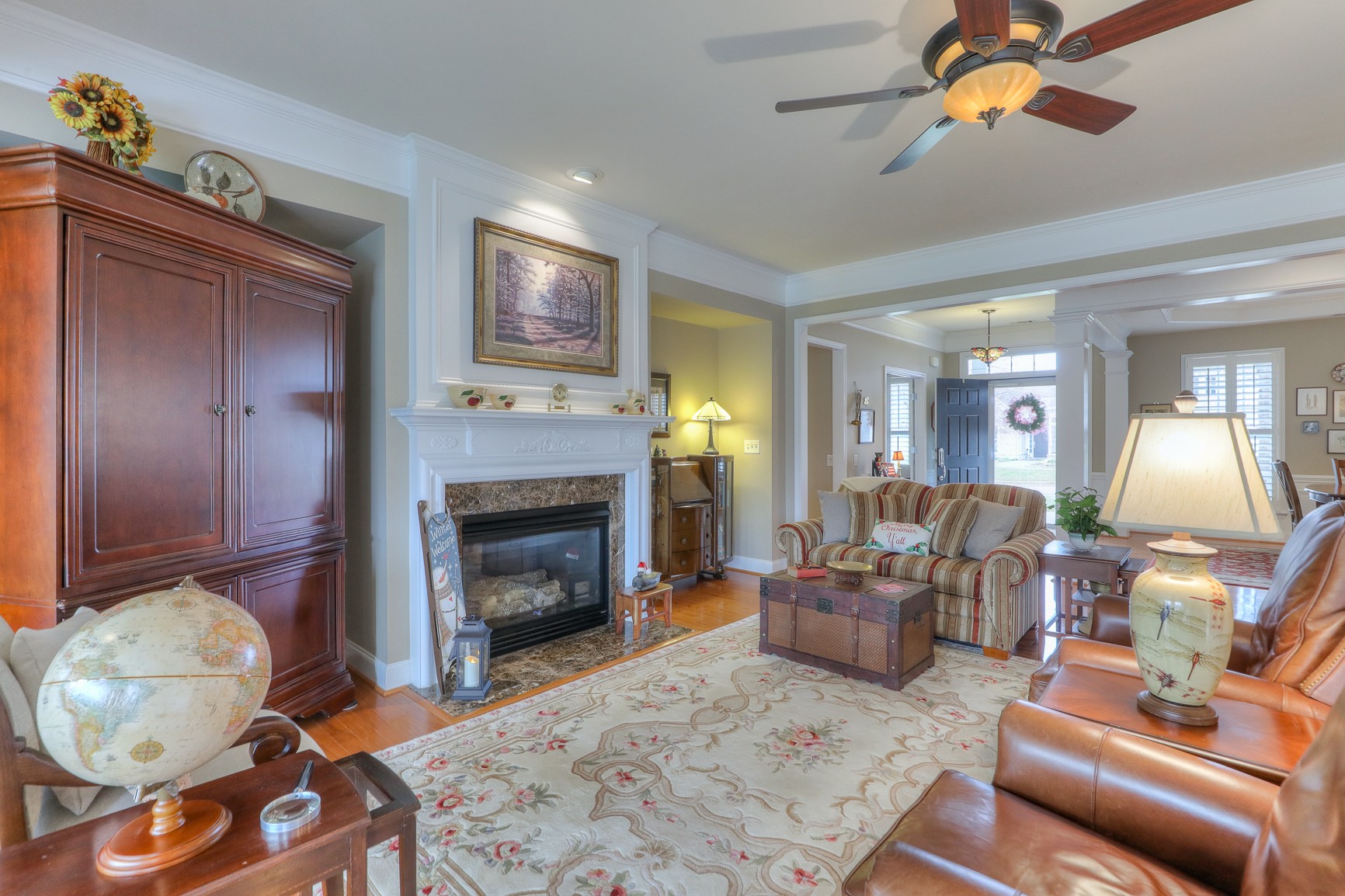 514 Bugler Road Mount Juliet, TN 37122 - Photo 11 of 45 a living room with furniture and a fireplace