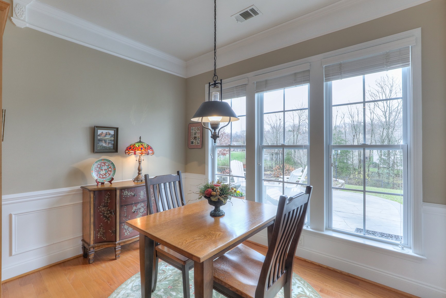 514 Bugler Road Mount Juliet, TN 37122 - Photo 16 of 45 a view of a dining room with furniture large window and wooden floor