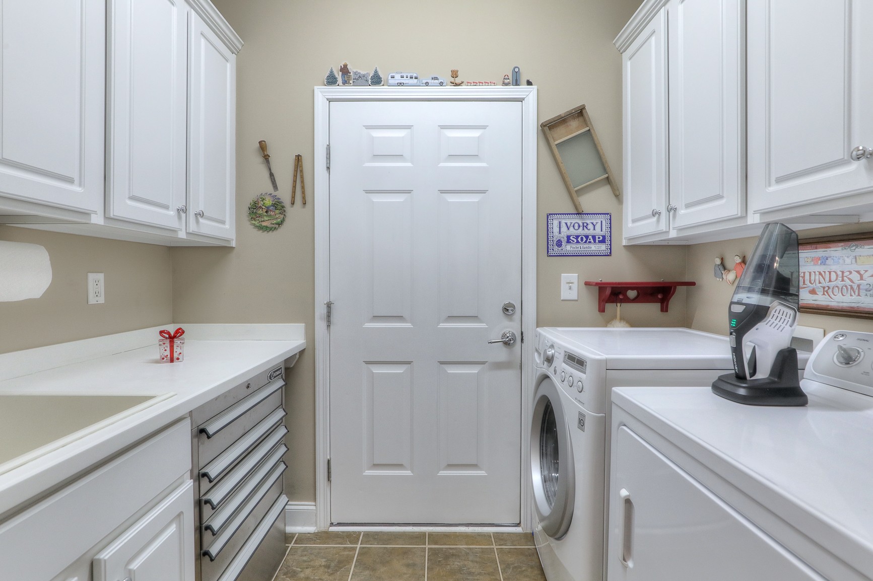 514 Bugler Road Mount Juliet, TN 37122 - Photo 30 of 45 a kitchen with white cabinets and white appliances