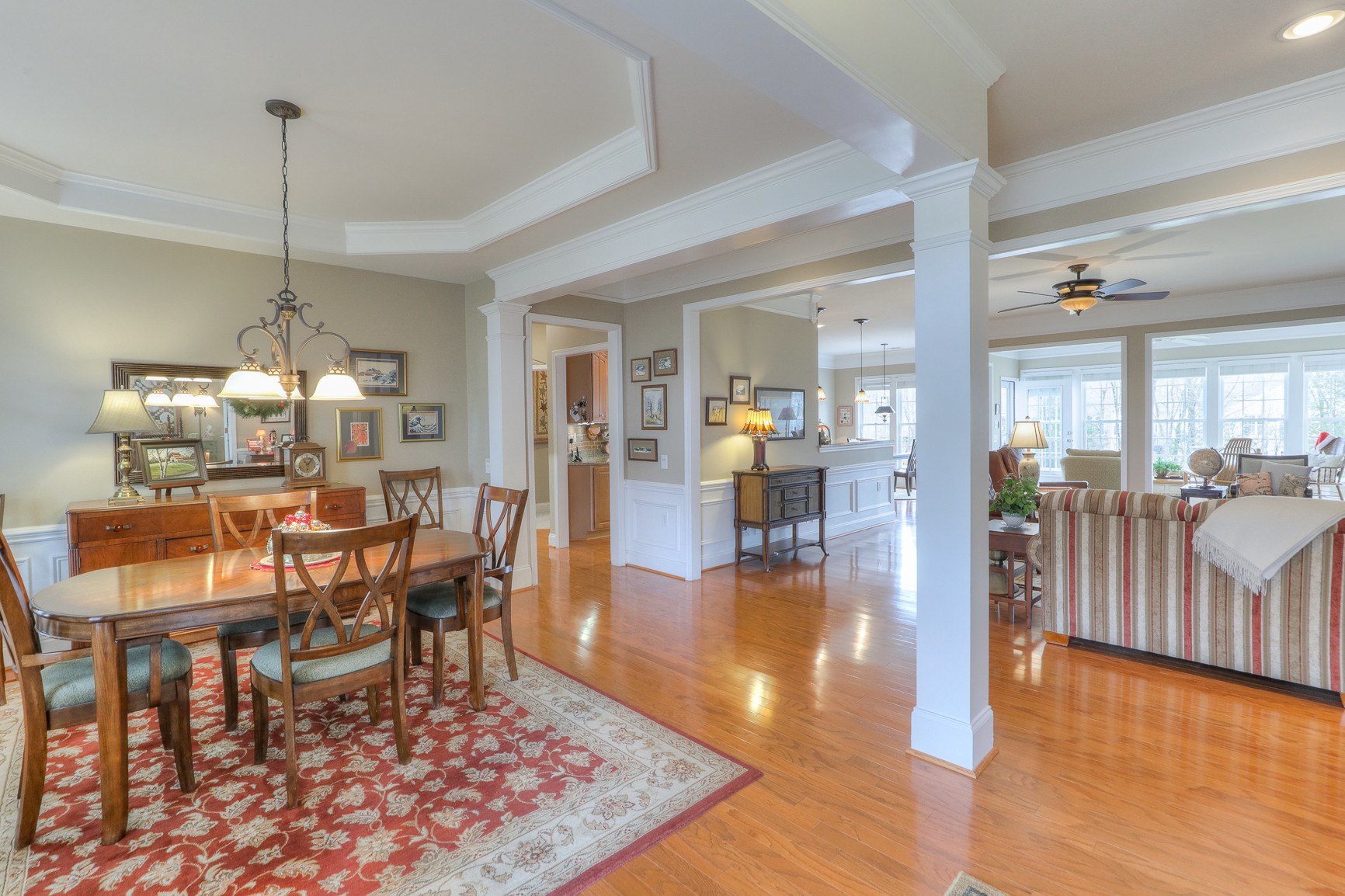 514 Bugler Road Mount Juliet, TN 37122 - Photo 6 of 45 a view of a dining room and livingroom with furniture wooden floor a chandelier
