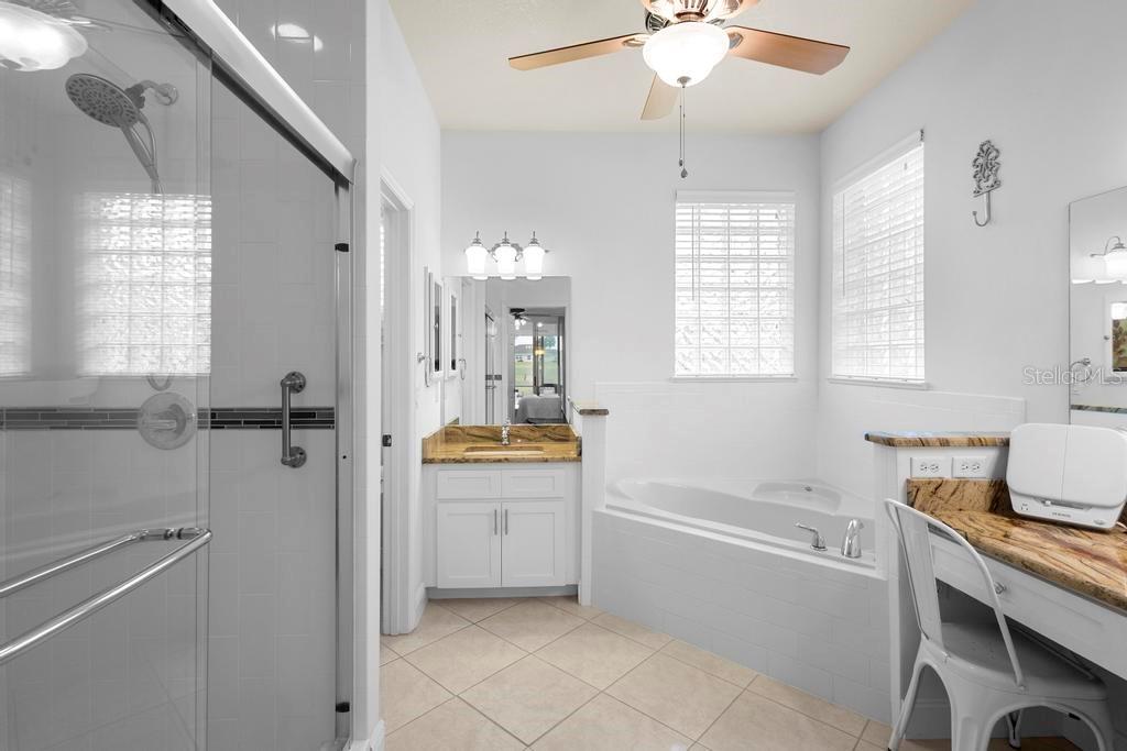 11767 Southeast 176th Place Road Summerfield, FL 34491 - Photo 20 of 37 PRIMARY BATHROOM with WALK-IN SHOWER