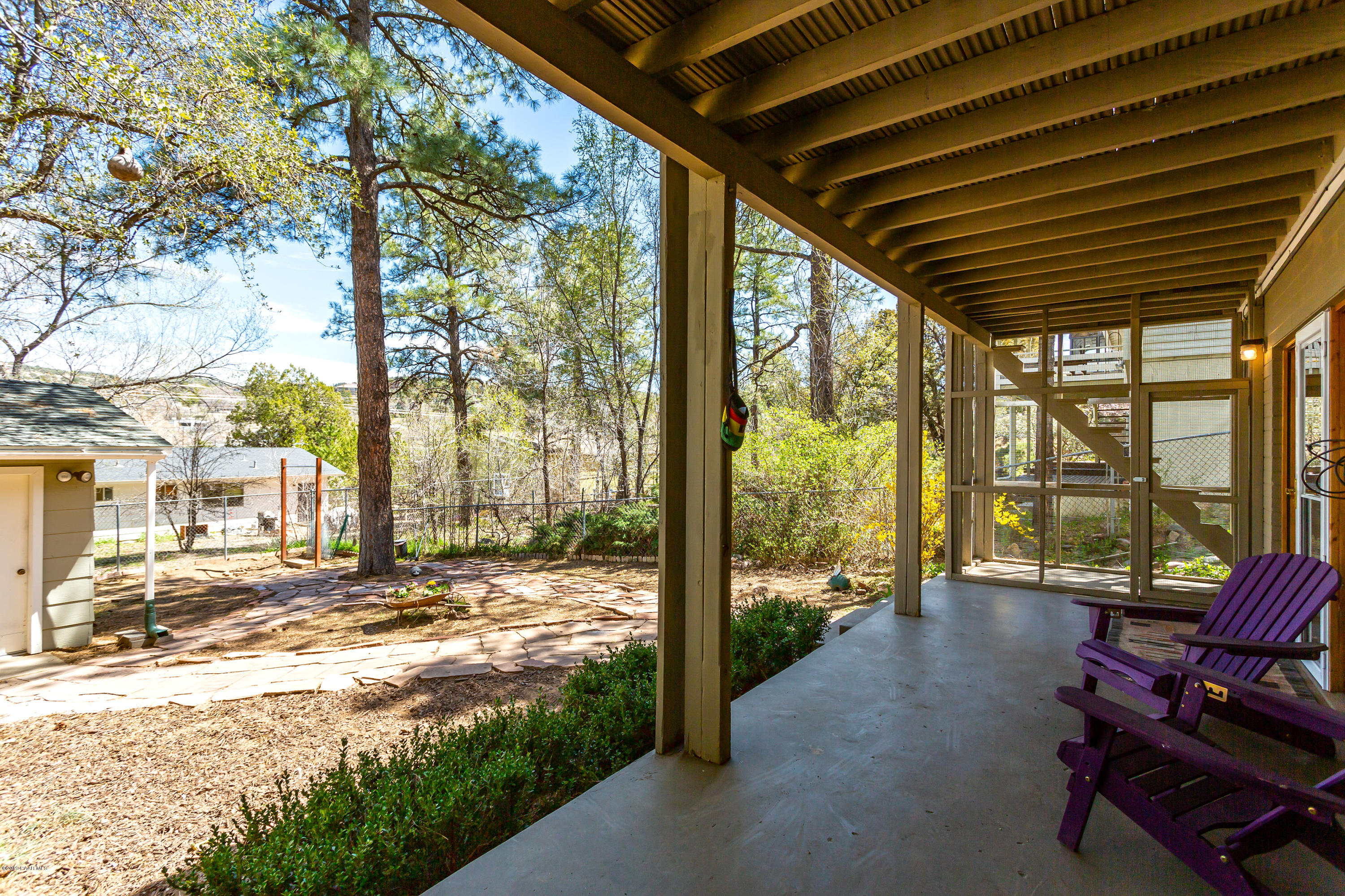401 Canyon Springs Road Prescott, AZ 86303 - Photo 26 of 28 Covered patio to fenced backyard
