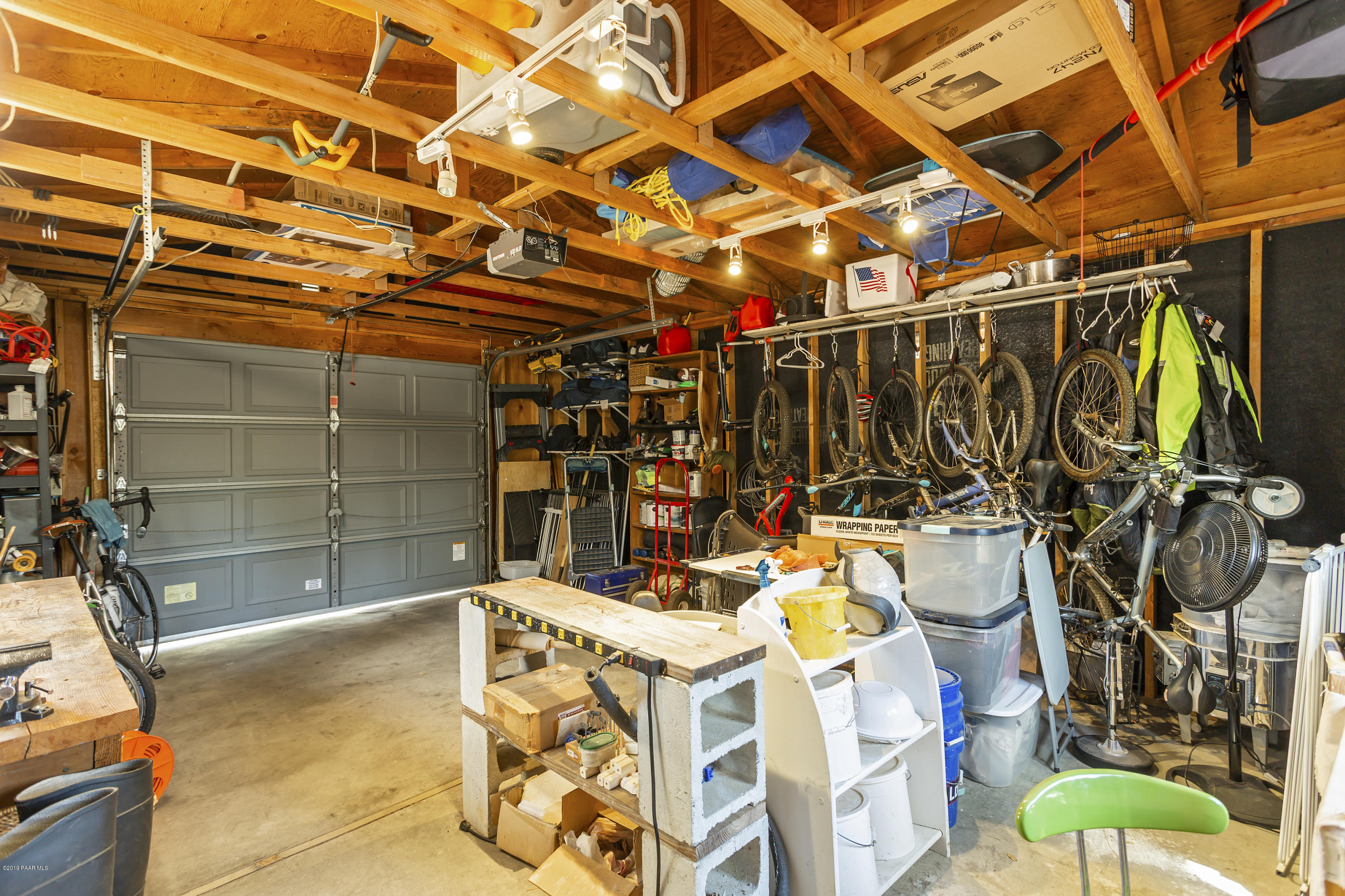 401 Canyon Springs Road Prescott, AZ 86303 - Photo 27 of 28 Over-sized garage with workbench