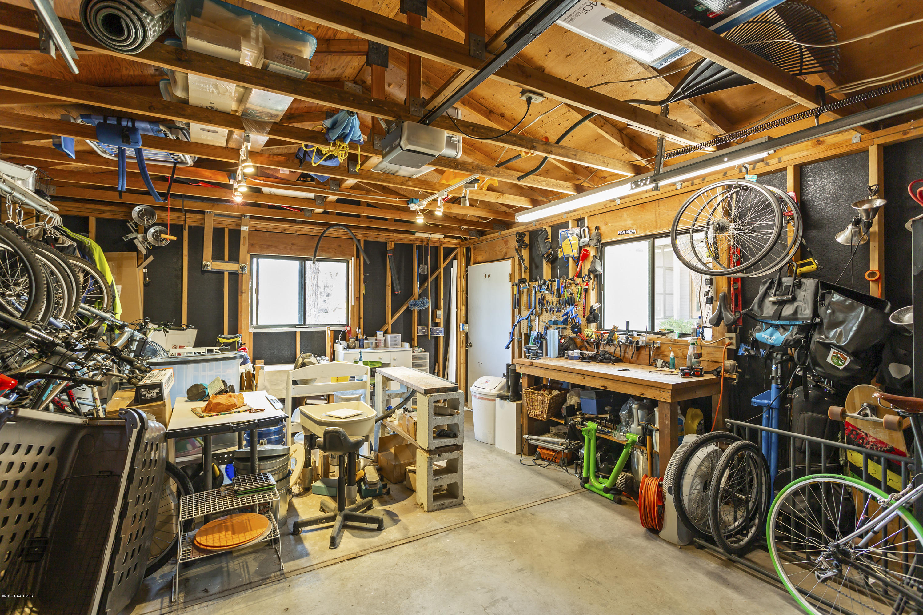 401 Canyon Springs Road Prescott, AZ 86303 - Photo 28 of 28 Over-sized garage with workbench